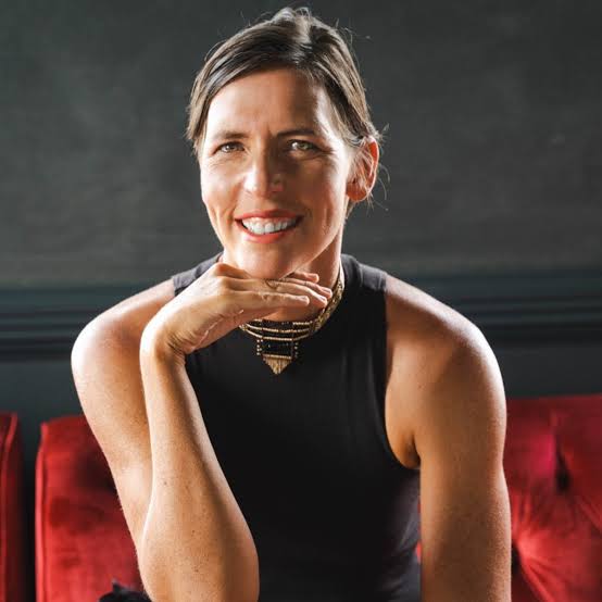 Carina Bruwer, keynote speaker, entrepreneur, and open-water swimmer, posing for a professional portrait.