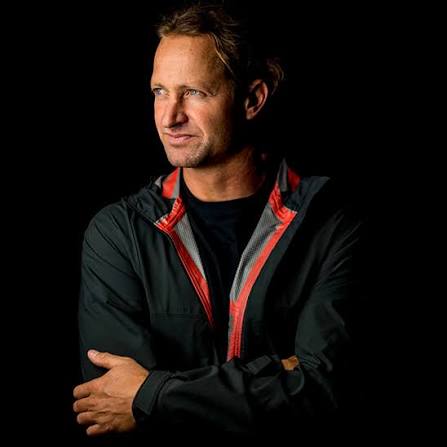 Portrait of motivational speaker and ocean adventurer Chris Bertish against a dark background.