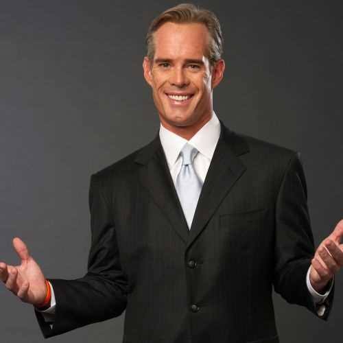 Sports broadcaster and keynote speaker Joe Buck wearing a dark suit and tie.