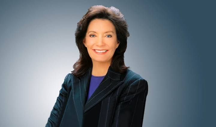 Professional headshot of keynote speaker Linda Alvarado in a blazer.